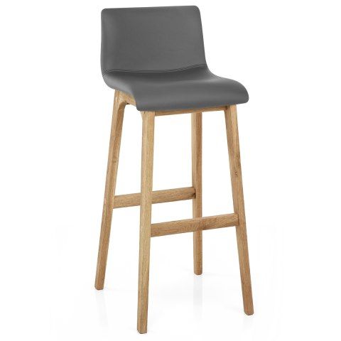 grey leather bar stool with wooden legs and backrests on an isolated white background