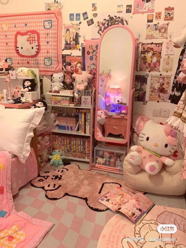 a bedroom with hello kitty decorations and furniture