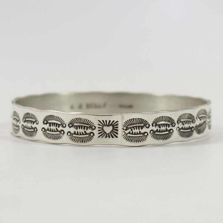 Sterling Silver Bangle Bracelet with Hand-Stamped Designs. .375” Bangle Width, 8” Inner Circumference Silver Bangle Bracelet, Sterling Silver Bangle Bracelets, Sterling Silver Bangle, Silver Bangle Bracelets, Sterling Silver Bangles, Silver Bangle, Bracelet Argent, Silver Bangles, Bangle Bracelet