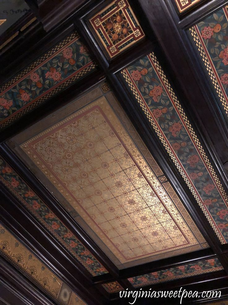 the ceiling is decorated with intricate designs