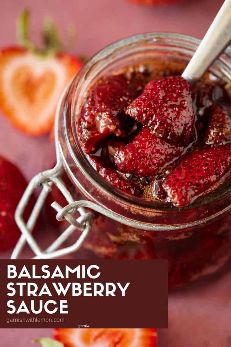 balsamic strawberry sauce in a glass jar with a spoon