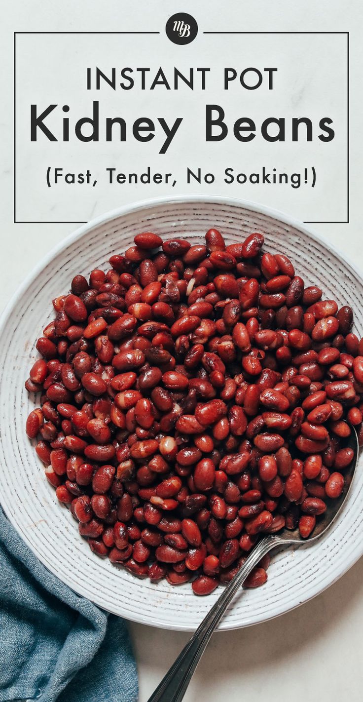 instant pot red beans in a white bowl with a spoon and napkin next to it