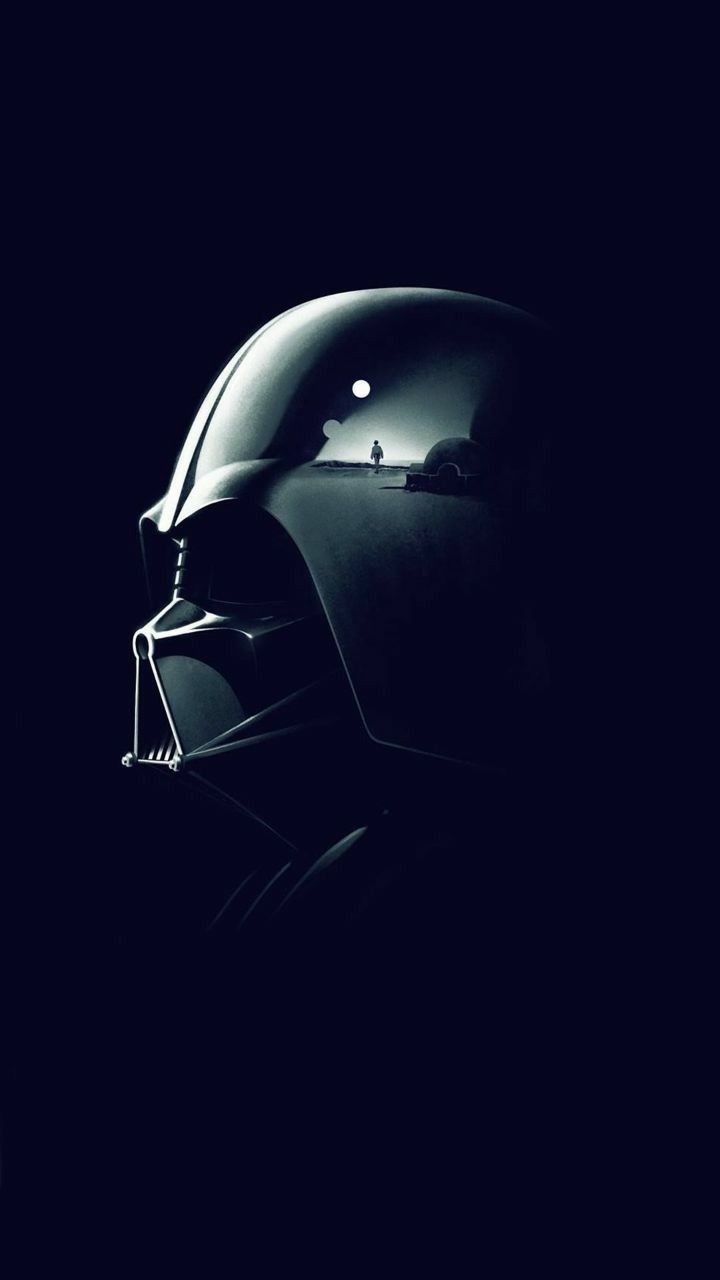 a darth vader helmet is shown in the dark