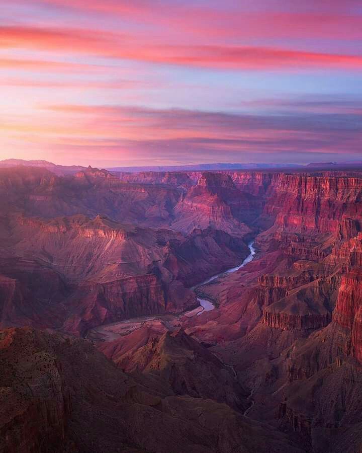 the sun is setting at the edge of a canyon in grand canyon national park, colorado