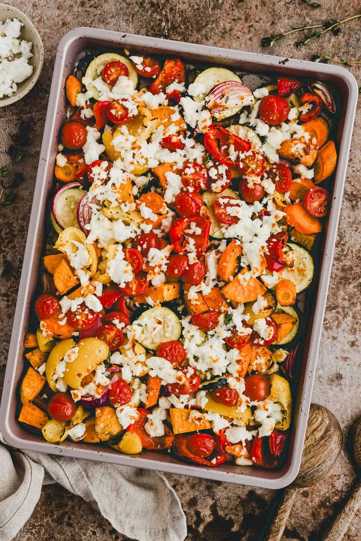 a pan filled with lots of different types of vegetables