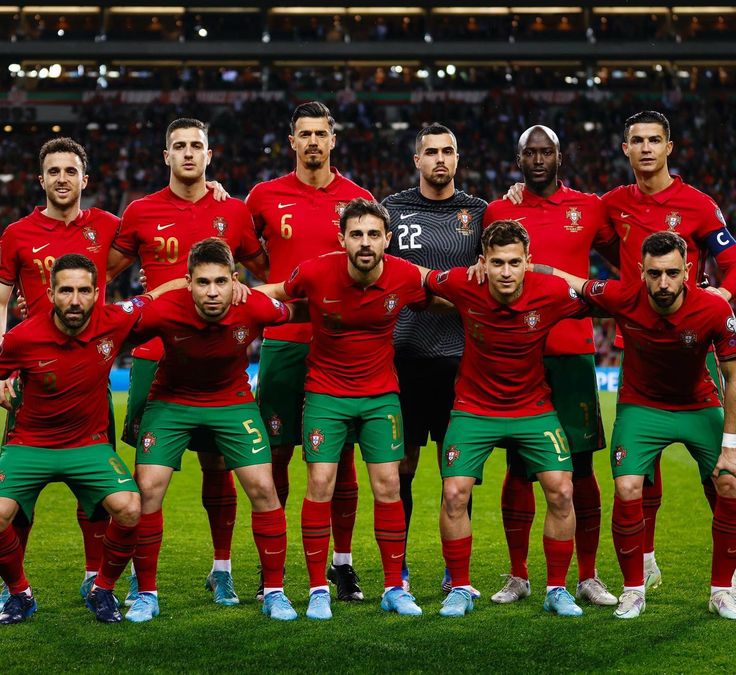 the portugal team line up for a group photo