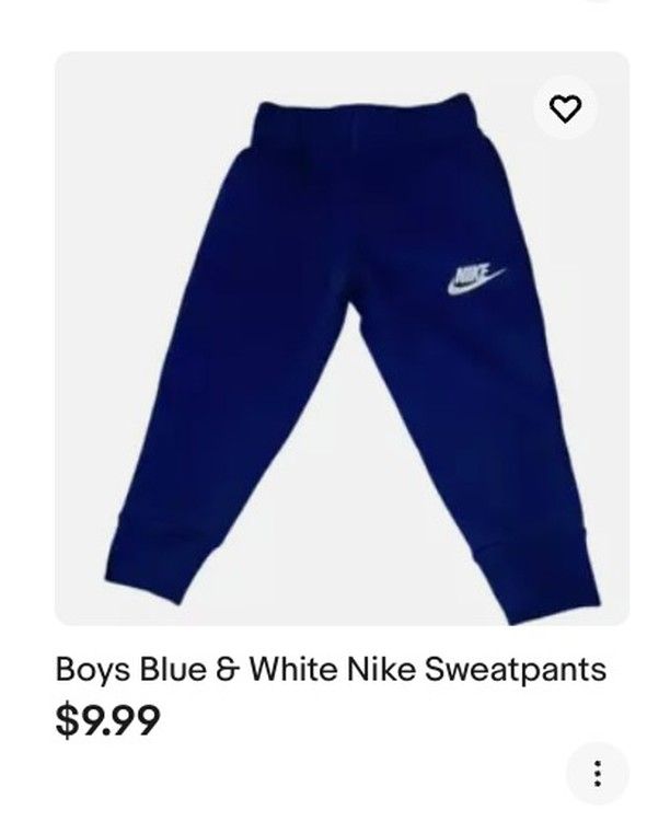 Take your little athlete's performance to the next level with these boys' blue and white Nike sweatpants. Designed for comfort and durability, these athletic joggers feature a pull-on closure, making them easy to wear for any occasion. The machine-washable fabric is a blend of 60% cotton and 40% polyester, ensuring a comfortable fit and easy care. Ideal for sports activities such as walking, basketball, and running, these pants are perfect for any young boy who loves to stay active. The Nike ... White Nike Sweatpants, Athletic Joggers, Iron Design, Lay On, Nike Sweatpants, Nike Boy, Nike Brand, Stay Active, Athletic Performance