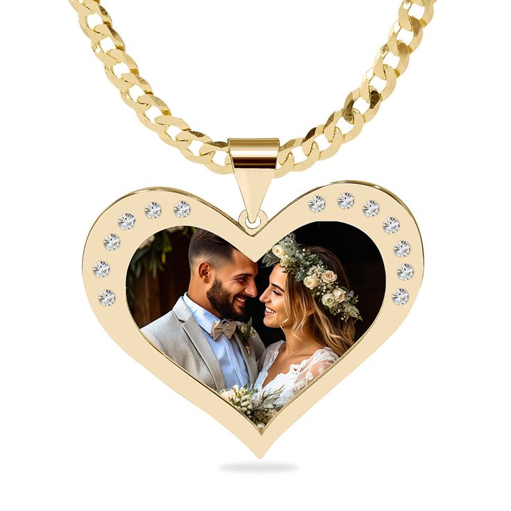 This Heart portrait pendant with stones is the perfect gift for that special someone. One subject can be taken from a photo and engraved in spectra color onto the finished piece making it a colored heirloom to treasure. Available in sterling silver and 14K over sterling silver. Measures: 1.25" x 1". Get Yours Today! *The coating process we use on the photo pendant may slightly darken the photo. Customizable Heart Pendant Jewelry For Keepsake, Customizable Heart Pendant Jewelry For Anniversary, Keepsake Diamond Pendant Jewelry, Customizable Gold Heart Pendant Jewelry, Diamond Pendant Jewelry For Keepsake, Gold Diamond Jewelry For Keepsake, Valentine's Day Medallion Jewelry For Anniversary, Diamond Pendant Custom Necklace For Gift, Engraved Diamond Jewelry For Valentine's Day