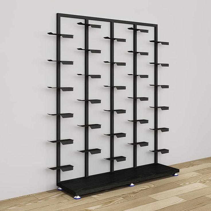 a black book shelf with several shelves on each side and four feet in the middle