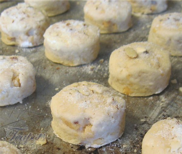 doughnuts are sitting on a baking sheet and ready to be baked in the oven