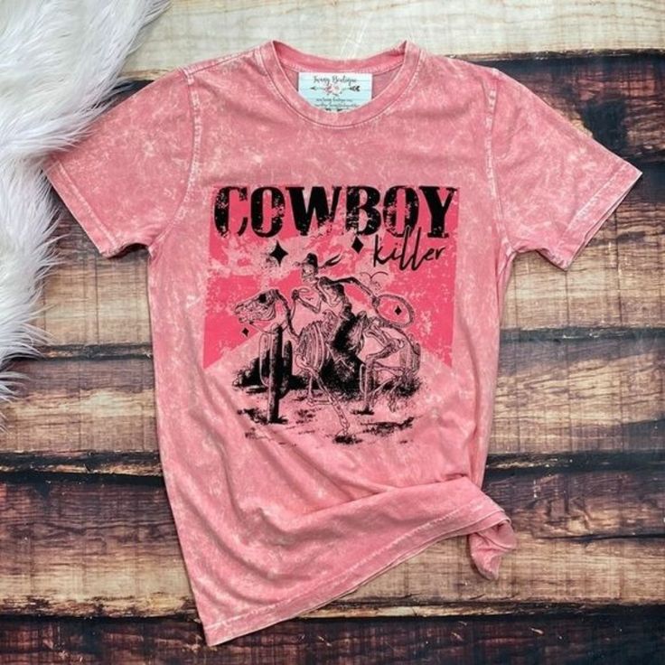 Cowboy Killer! Kill 'Em In This Pink Acid Wash Tee Shirt Country Skeleton Wranglin On A Horse Print 100% Cotton S: 19 Inches Armpit To Armpit/29 Inches In Length M: 21 Inches Armpit To Armpit/30 Inches In Length L: 22.5 Inches Armpit To Armpit/31 Inches In Length Casual Distressed Tops For Rodeo, Pink Distressed Graphic Tee, Pink Distressed Cotton Tops, Summer Rodeo Shirt With Graphic Print, Western Style Screen Print Crew Neck Top, Western Crew Neck Top With Screen Print, Summer Graphic Print Shirt For Rodeo, Western Style Crew Neck Top With Screen Print, Fitted Crew Neck Top For Rodeo