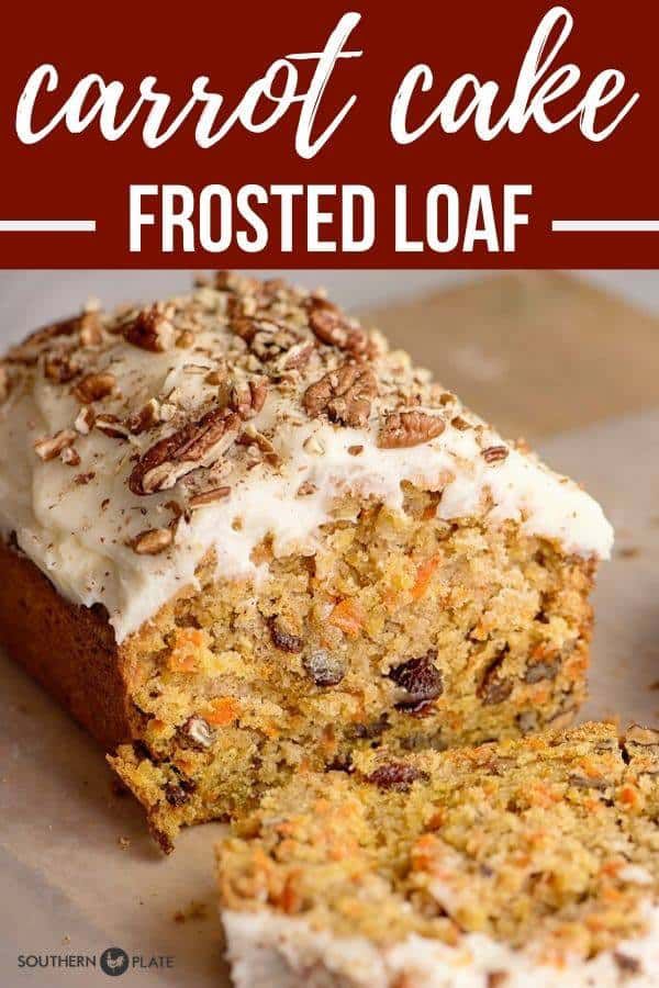 carrot cake frosted loaf on a cutting board