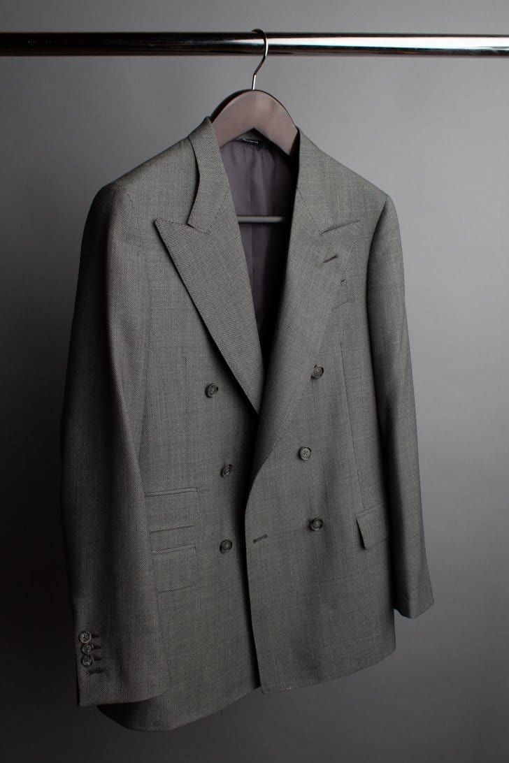 Our best-seller. A handmade bespoke suit crafted from an iconic 4-season worsted wool fabric made in Italy. This fabric is known as the ultimate "workhorse"; it's durable, resilient and can be worn in any season and any weather. If you're looking for a go-to suit that's always ready for anything, anytime - this is it. Classic Winter Tuxedo, Tailored Timeless Suit And Tie Accessories, Classic Winter Tuxedo For Business Casual, Business Wool Double Breasted Suit With Welt Pockets, Business Double Breasted Wool Suit With Welt Pockets, Bespoke Tailored Winter Suits, Timeless Tailored Double Breasted Suit With Notch Lapel, Bespoke Wool Blazer Custom Fit, Timeless Double Breasted Suit With Notch Lapel