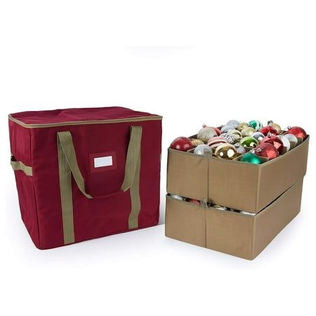 two boxes with christmas ornaments in them sitting next to each other on a white background