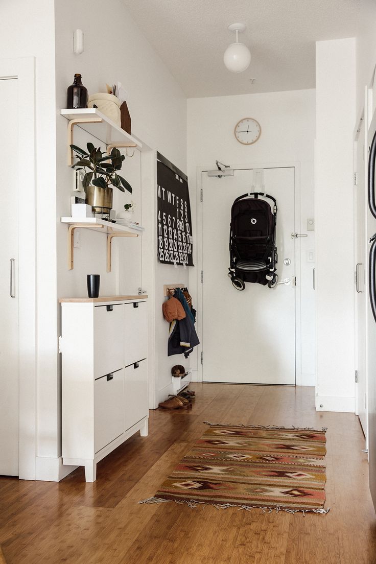 the hallway is clean and ready to be used as a home office or living room