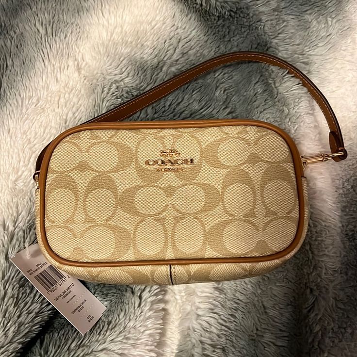 Never Used, Light Beige, Mini Bag Coach Beige Rectangular Bag, Coach Beige Clutch Bag, Elegant Coach Beige Coin Purse, Coach Cream Clutch Bag, Beige Coach Coin Purse, Beige Coach Shoulder Bag With Zipper Closure, Brown Rectangular Coach Coin Purse, Coach Mini Bag, Coach Clutch Shoulder Bag For On-the-go