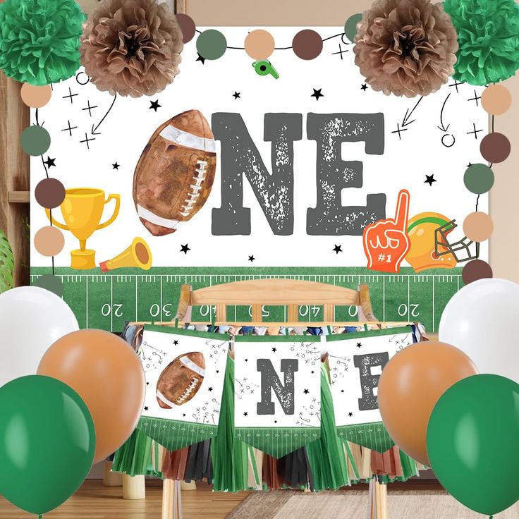 a football themed first birthday party with decorations