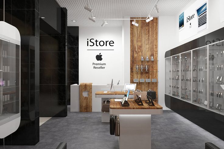 an apple store with glass display cases on the wall and wooden shelves in front of them