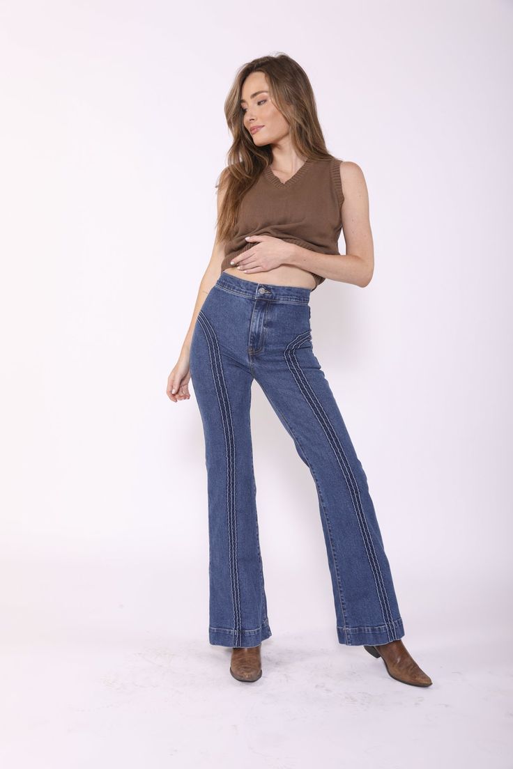 DESCRIPTION With premium fabric and careful hand stitched design we created these dreamy 70's inspired bells. These jeans are high waisted and fitted. Made to hug your hips and accentuate your curves. These jeans run true to size. + DETAILS - 34" Inseam- 22" Flare- High Waisted- True to size- Saddleback Caballo stitching on butt- Front Pleat Piping Detail + FABRIC - High Quality Cone Mills Fabric- Comfort Stretch Denim- 98% Cotton, 2% Elastane + SIZING -Model is 5'8 wearing size 25. - 24=00, 25= Blues Clues, Vintage Soft, High Hips, 70s Inspired, Jeans Size Chart, Denim Design, Stitch Design, Hug You, Premium Denim