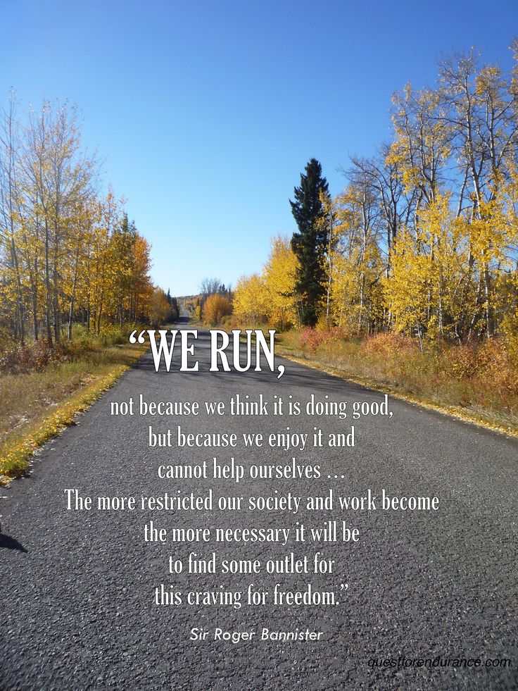 an empty road with a quote on it that says we run