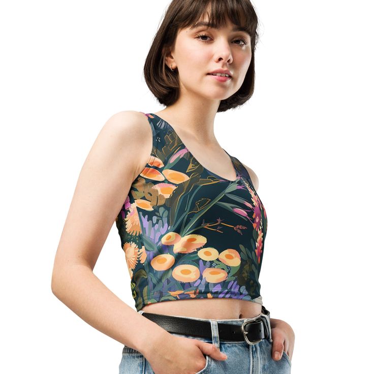 Look fabulous in an all-over printed, body-hugging crop top, now offering FREE SHIPPING to the US, Canada, EU, and UK! The artwork This artwork is an enchanting portrayal of Alpine flowers, set in a serene mountainous landscape. It captures a diverse array of wildflowers blooming amidst rocky terrains and dark, lush foliage. The painting features a rich palette of soft oranges, pinks, yellows, and purples, reflecting the delicate beauty and variety of flowers found in high-altitude regions. The Multicolor Floral Print Crop Top, Workspace Essentials, Alpine Flowers, French Collection, Alpine Meadow, Crop Tops Women, Crop Top, Spring Collection, Laptop Sleeves