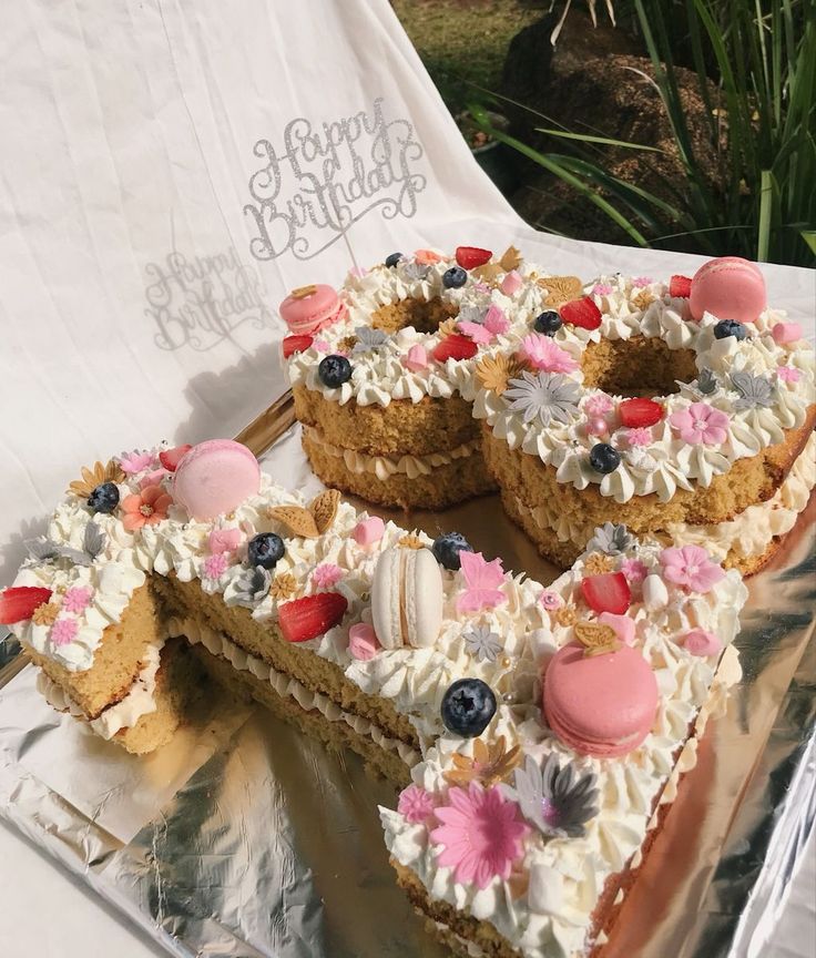 there is a cake that has been cut in half and ready to be served on the table