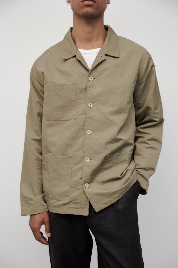 Information Blend function with style in The Keenan Jacket. This fatigue shirt jacket embraces a relaxed fit, complemented by front pocket details and a distinctive nylon textured fabric. Practical yet stylish, it's the perfect addition to your wardrobe, combining utility with modern design for a versatile and comfortable look. Details 100% Nylon Regular Fit Front Pockets Textured Nylon Fabric Tonal Buttons Wilson is 6'2" and wearing a size LargeMeasurements: 34" Chest, 31" WaistStyle #OA1215 Nylon Fabric, Textured Fabric, Pocket Detail, Online Branding, Lifestyle Brands, Shoe Brands, Shirt Jacket, Front Pocket, Best Sellers