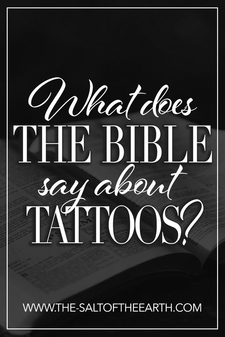 an open book with the words what does the bible say about tattoos?