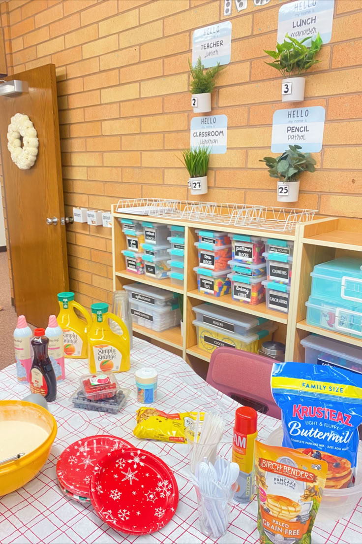 the table is covered with baking supplies and utensils