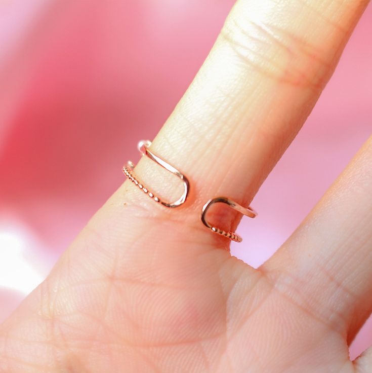 Details: 18K Rose Gold Plated Adjustable Size Anti-tarnish, anti-allergy, nickel-free. Designed in USA Rose Gold Open Ring Jewelry For Valentine's Day, Rose Gold Open Heart Ring Gift, Rose Gold Open Ring For Valentine's Day, Rose Gold Tarnish Resistant Rings For Gift, Rose Gold Tarnish-resistant Rings For Gift, Rose Gold Tarnish-resistant Promise Ring, Everyday Rose Gold Heart Ring, Rose Gold Open Heart Ring, Dainty Rose Gold Heart Shaped Open Ring