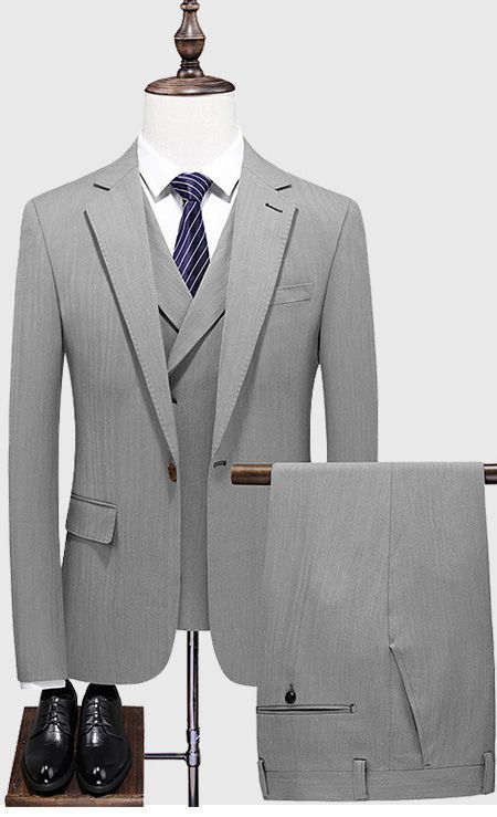 The Light gray 3 piece suit is part of our formal wear collection where the formal look is enhanced through our unique double breast notch lapel waistcoat. Light grey suit making it ideal for any occasion and any season. Elegant Gray Double Breasted Suit For Semi-formal Occasions, Gray Single Breasted Suit For Workwear, Gray Single-breasted Suit For Work, Gray Formal Blazer With Suit Collar, Gray Blazer With Suit Collar For Formal Occasions, Tailored Gray Blazer, Gray Single Button Suit For Office, Gray Single Button Semi-formal Suits, Gray Double-breasted Suit For Business