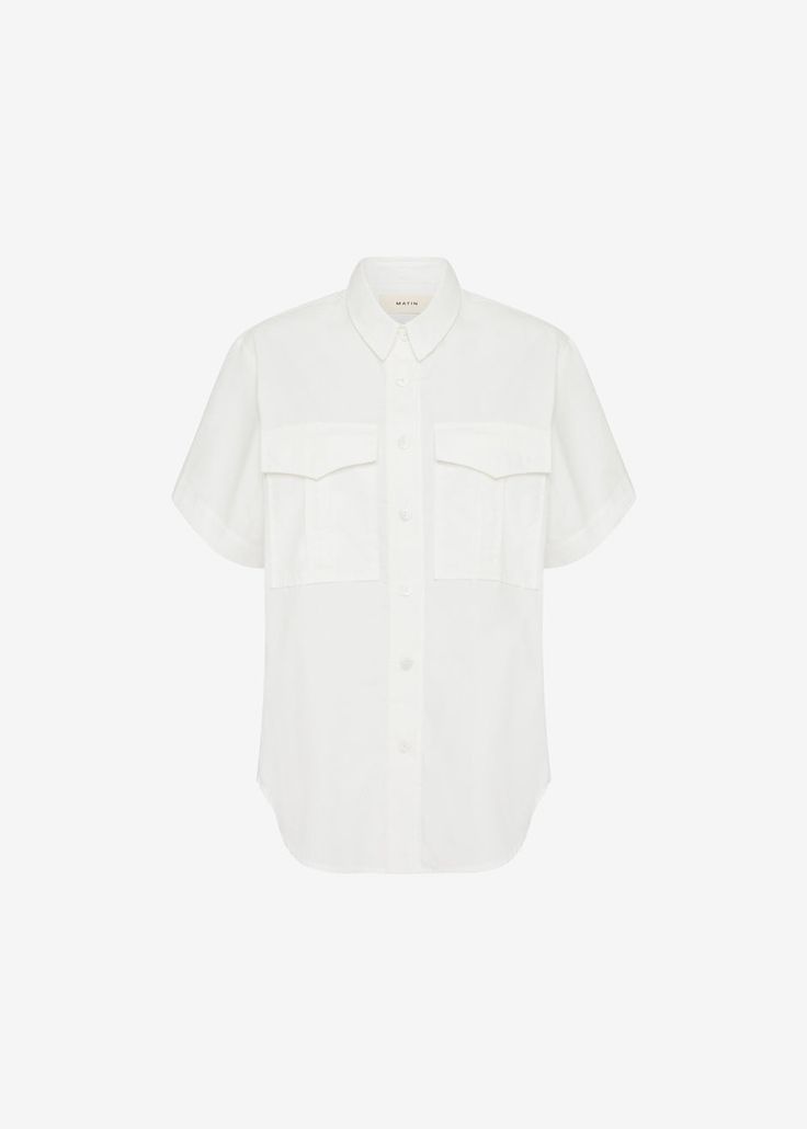 Color: White Lightweight cotton poplin Relaxed fit Straight collar Wide short sleeves Flap chest pleated pockets Front button closure Unlined 100% Cotton Cold Gentle Machine Wash By MATIN. Made and designed in Australia Paris Store, Denim Suit, Paris Woman, Pocket Shirt, Leather Texture, Swimwear Accessories, Cotton Poplin, Chef's Jackets, Jumpsuit Dress