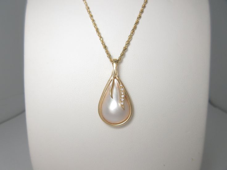 Pearls are the Gem of Sincerity, Faith, innocence & Integrity Antique 14K Solid Gold Japanese Cultured Pearl Diamond Necklace * Pendant Measures Approx 31mm X 16mm * 5.6 Grams 20 Inch Natural Diamonds VS/GH Lobster Claw Give the Gift of Faithfulness & Devotion N144 Formal Hallmarked Teardrop Necklace, Classic Yellow Gold Bridal Necklace For Formal Occasions, Classic Akoya Pearl Diamond Necklace For Anniversary, Hallmarked Yellow Gold Pearl Necklace For Anniversary, Fine Jewelry Custom Pendant Necklace For Wedding, White Heirloom Jewelry With High Luster, Heirloom White Jewelry With High Luster, White High Luster Heirloom Jewelry, Classic Teardrop Diamond Necklace For Wedding