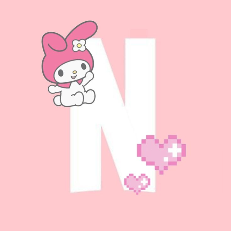 the letter n is decorated with an image of hello kitty and her pink bow on it