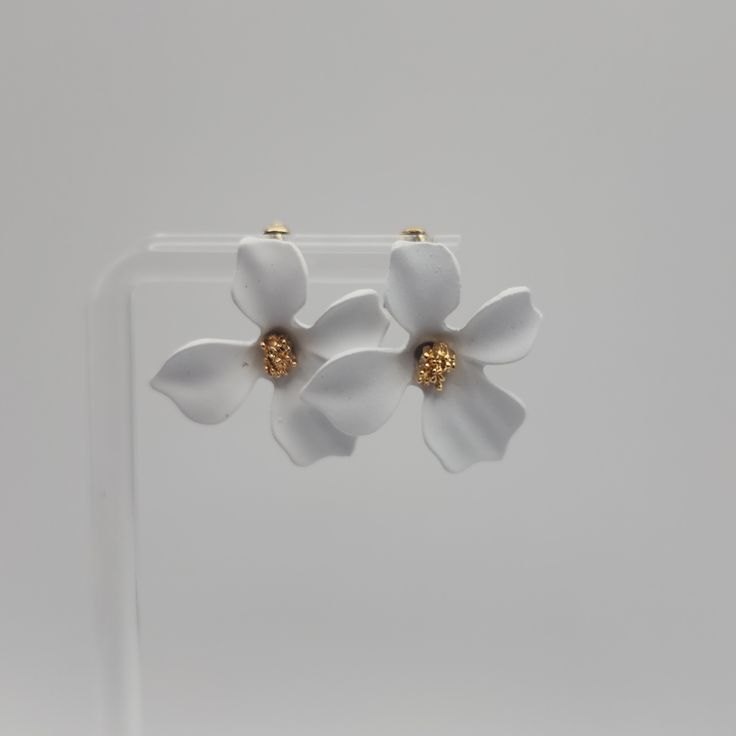 White Flower Earrings Size: 1" Petals Are Acrylic (Lightweight) Beautiful White Acrylic Flower With Gold Center Gives Great Dimension To These Post Statement Earrings. White Earrings With Flower Charm, White Drop Earrings For Spring, White Flower Earrings For Spring Wedding, White Drop Earrings With 3d Flowers, White Flower Decorated Earrings For Spring, White Flower Charm Jewelry For Spring, White Flower Drop Earrings For Pierced Ears, White Flower Earrings For Spring, White Flower Shaped Jewelry With Flower Decoration