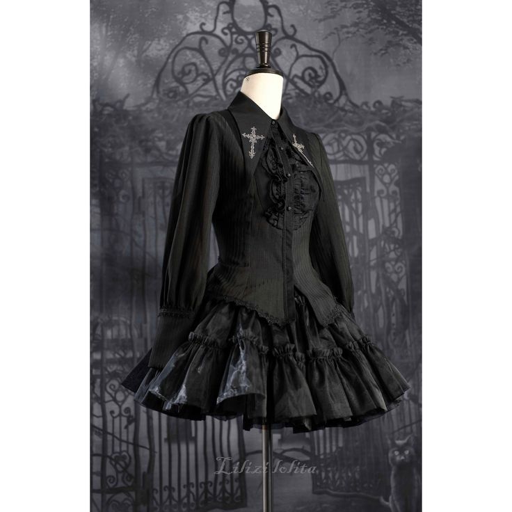 A gothic blouse that looks like an aristocratic lady from medieval Europe. Her collar has a cross sword embroidered on it, the back is laced, and the chest is decorated with a statement frill. She is a mysterious young lady with a gorgeous aura. 
 
 

 

 
 
 
 Size 
 
 XS size 
 
 Length: 63cm 
 Bust: 84cm 
 Waist: 72cm 
 Sleeve length: 62cm 
 
 S size 
 
 Length: 64cm 
 Bust: 88cm 
 Waist: 76cm 
 Sleeve length: 62cm 
 
 M size 
 
 Length: 65cm 
 Bust: 92cm 
 Waist: 80cm 
 Sleeve length: 62.5cm Gothic Long Sleeve Corset Dress For Costume, Black Long Sleeve Corset Dress For Costume, Gothic Long Sleeve Corset Dress, Fitted Gothic Tops, Gothic Formal Tops With Ruffles, Gothic Long Sleeve Corset For Costume Party, Gothic Ruffles Corset For Costume Party, Gothic Ruffled Corset For Costume Party, Gothic Black Top With Lace Collar