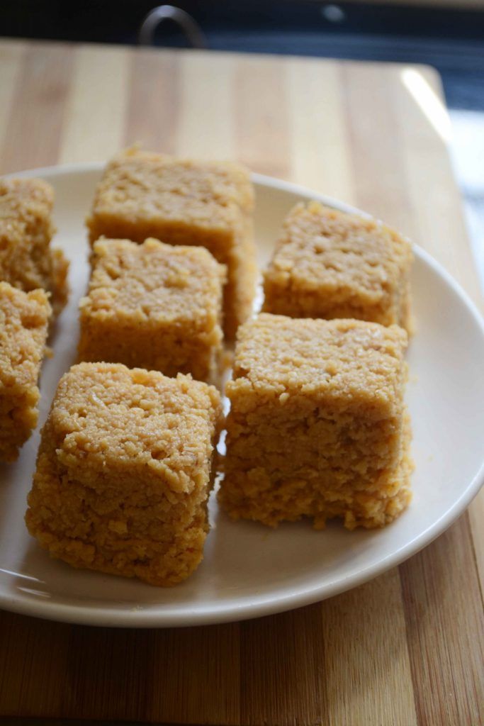 several squares of food on a white plate