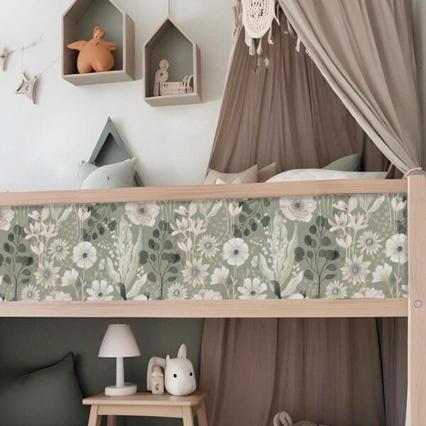 a child's bedroom with a canopy bed and stuffed animals on the shelfs