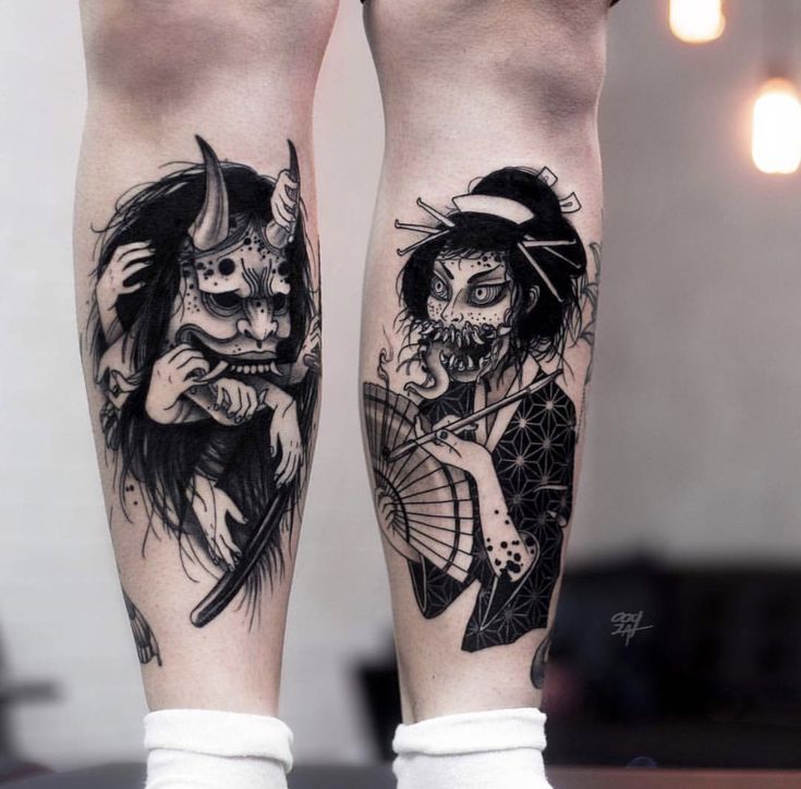 two people with tattoos on their legs