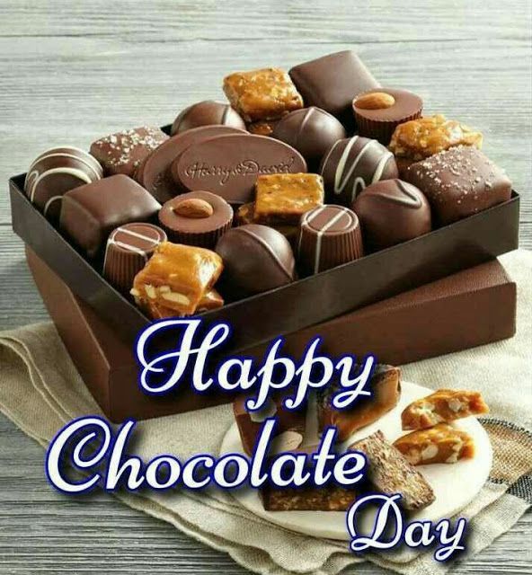 happy chocolate day greeting card with lots of different types of candies in a box