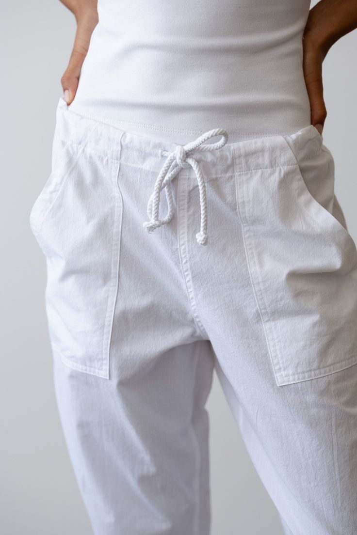 The Sandwash Painter Pant is crafted from our lightweight 100% Cotton Sandwash fabric. This full length pant features a drawcord waistband, side and back pockets, and a hammer loop. Made in Los Angeles Utility Tapered Leg Pants With Drawstring, Utility Pants With Drawstring And Tapered Leg, Utility Drawstring Tapered Leg Pants, Relaxed Fit Drawstring Bottoms For Daywear, Utility Style Drawstring Pants For Loungewear, Utility Drawstring Pants For Loungewear, Everyday Wide Leg Drawstring Pants, Everyday Wide Leg Pants With Drawstring, White Utility Bottoms For Everyday