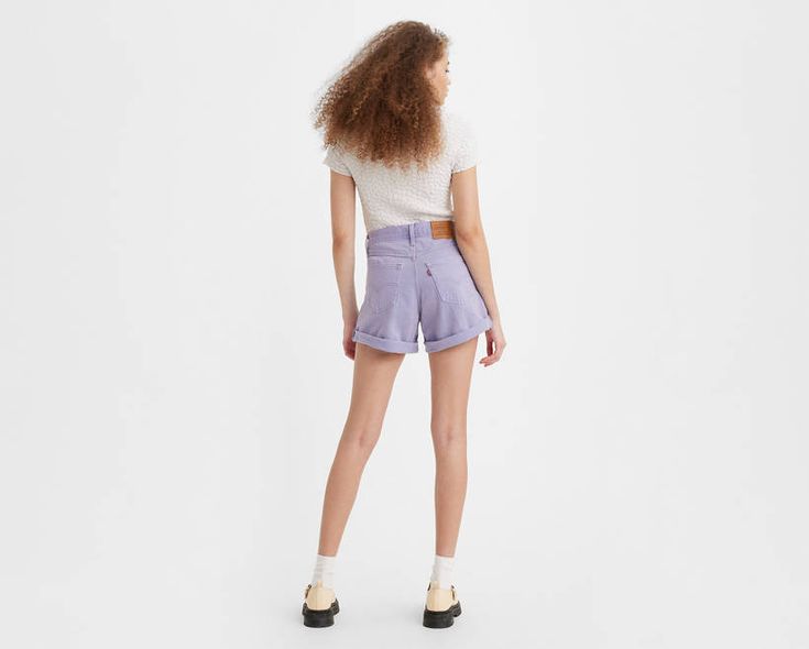 A vintage-inspired flattering fit featuring the higher-than-high rise that made the '80s the fashion decade we can't stop talking about. With an updated design and a rolled hem, think of these '80s Mom Shorts as your parent's shorts, but better. Vintage, '80s-inspired fit Featuring a 10” high rise A-line leg opening designed to flatter your legs Finished with a rolled hem Retro Relaxed Fit Bottoms With Belt Loops, Retro Bottoms With Belt Loops And Relaxed Fit, Trendy Cotton Bottoms With Rolled Hem, Trendy Bottoms With Belt Loops For Spring, Vintage Levi's Shorts For Spring, 90s Inspired Fitted Cotton Bottoms, Retro High Waist Bottoms For Spring, 90s Inspired Fitted Short Bottoms, Vintage Levi's Summer Shorts