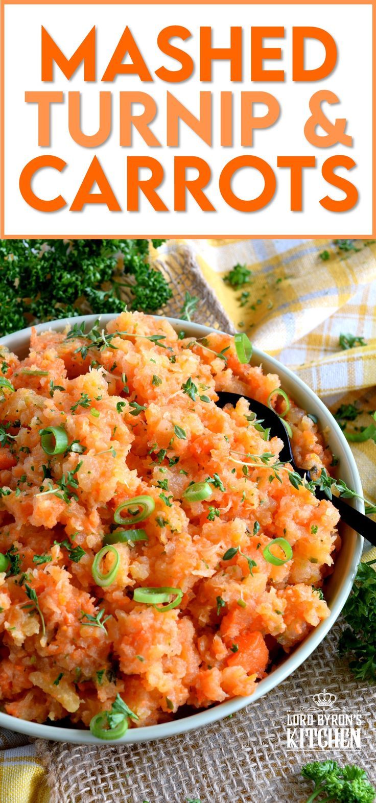 mashed turnip and carrots in a white bowl on a table with broccoli