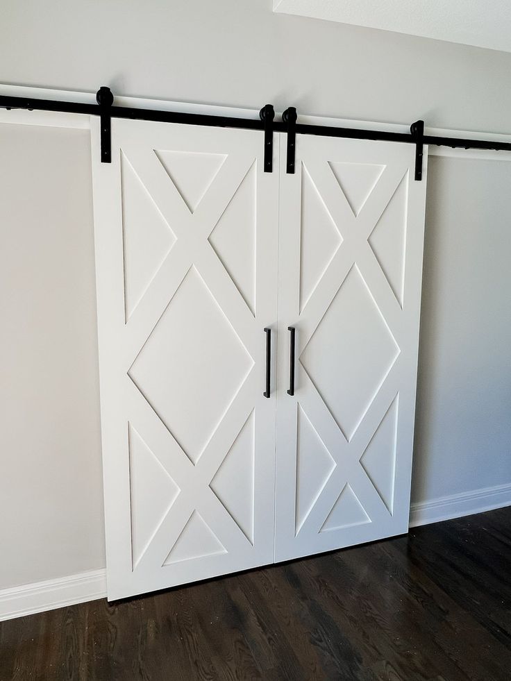 Walston Door Company Painted Door Painted Double X Door Small Double Sliding Barn Door, Barn Door With Window Painted, White Double Barn Doors Sliding, White Barn Door Double, Monogram Barn Door, Double Doors To Bedroom, Double Doors Bathroom, House Doors Interior, Barn Door Styles