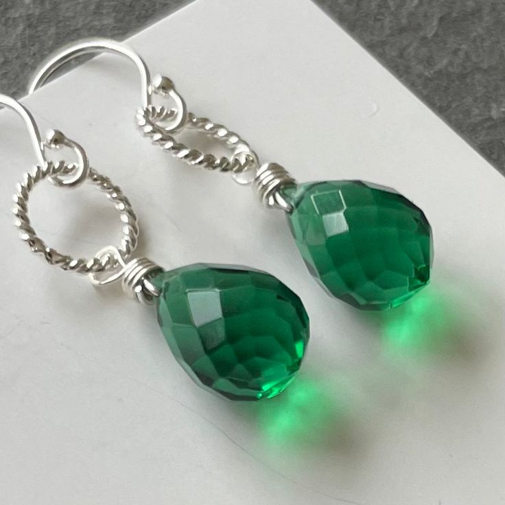 Fantastic plump dewdrop emerald green Quartz. The ultimate in color and sparkle. This stones is 12mm high, so it's not tiny. Sterling silver Hoop. Please choose your earwire ( options available exclusively at shirzay.com ) or the default French ball hook in sterling silver shown will be sent. APPRX. Length is 1 5/16”. Your jewelry will be beautifully giftboxed. Green Teardrop Jewelry With Ear Wire, Nickel-free Green Drop Jewelry, Green Nickel-free Drop Jewelry, Green Sterling Silver Teardrop Earrings Hypoallergenic, Emerald Earrings For Everyday May Birthstone, Emerald Earrings For Everyday And May Birthstone, Green Sterling Silver Teardrop Earrings, Green Sterling Silver Teardrop Earrings Gift, Green Faceted Sterling Silver Earrings