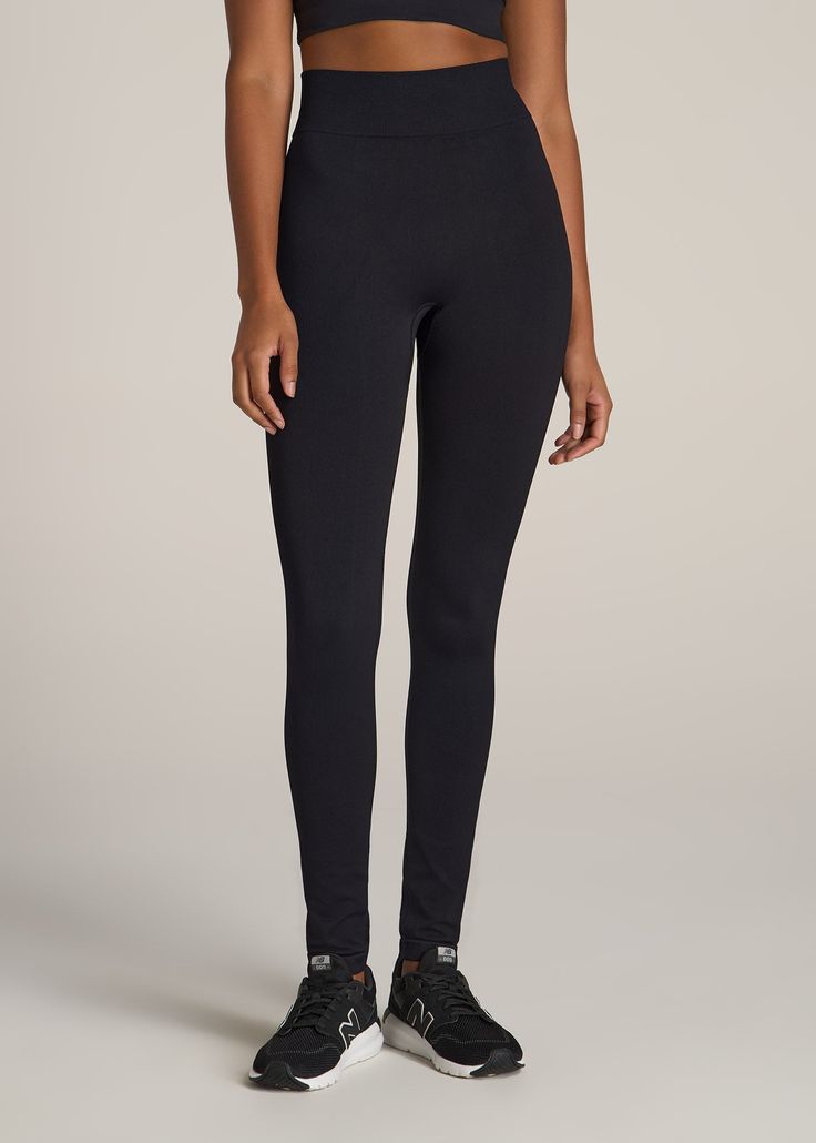 American-Tall-Women-Seamless-Compression-Legging-Solid-Black-front Functional Tight Seamless Leggings, Seamless Full-length Training Leggings, Functional Full Length Seamless Leggings, Seamless Tight Athleisure Leggings, Seamless Tight Leggings For Athleisure, Seamless Stretch Running Leggings, Seamless Elastane Leggings For Workout, Sporty Seamless Full-length Leggings, Seamless Elastane Leggings For Training