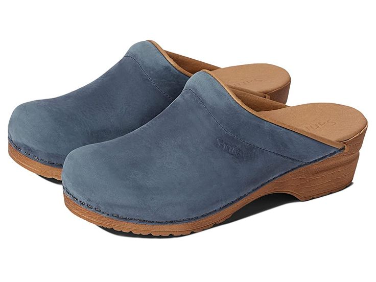 Sanita Ellis - Women's Shoes : Navy : Stay ready for the week with the easy slip-on silhouette and reliable comfort of the Sanita Ellis work clogs. This style is approved by the APMA and part of the Professional Collection. Sanita suggests sizing up for half-sizes. Leather clogs in a cushioned, open-backed silhouette. Oiled leather uppers with debossed logo detail. Textile lining offers breathable wear. Padded instep and a microfiber insole with an anatomically correct footbed for all-day comfor Workwear Slip-on Clogs With Rubber Sole, Classic Slip-on Clogs With Arch Support, Workwear Slip-on Clogs With Removable Insole, Classic Slip-on Clogs With Ortholite Insole, Comfortable Slip-on Clogs With Removable Insole, Casual Workwear Slip-on Clogs, Casual Clogs With Rubber Sole For Work, Casual Closed Toe Clogs For Workwear, Casual Workwear Clogs With Rubber Sole