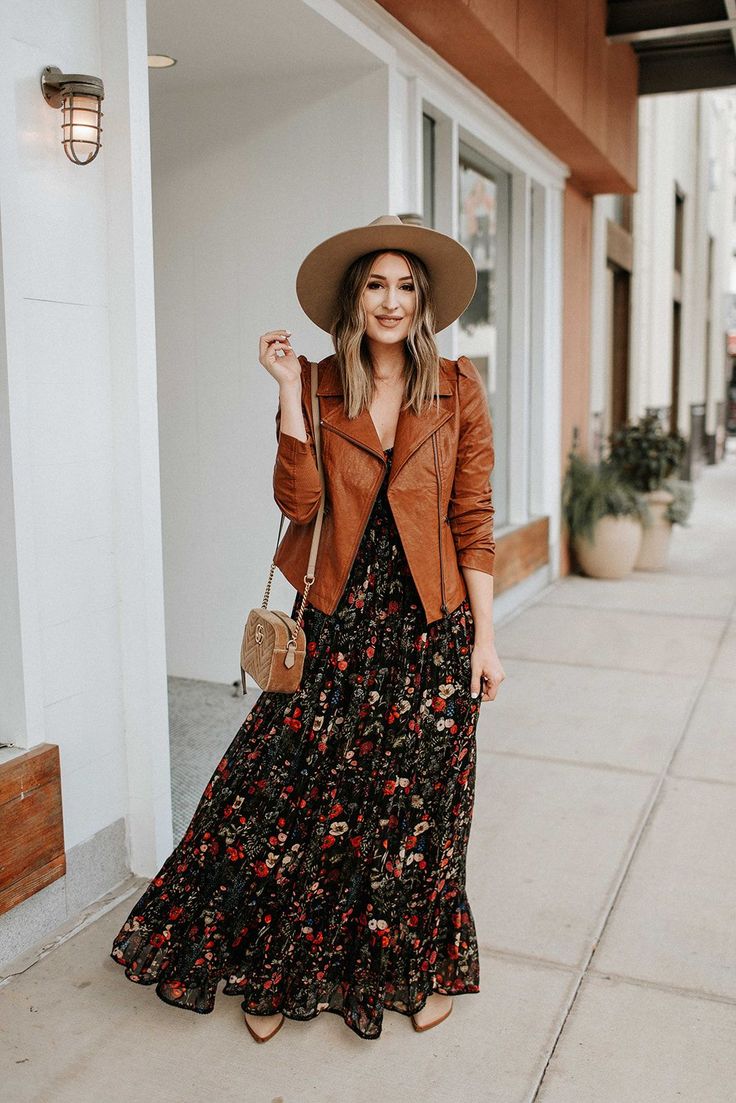 How to wear a maxi dress in the Fall Floral Dress Jacket Outfit, Long Dress Winery Outfit, Floral Maxi Dress With Leather Jacket, Boho Dress With Jacket, Hats With Dresses Outfits, Maxi Dress Jacket Outfit, How To Style A Maxi Dress For Winter, Dress With Leather Jacket Outfit, Dresses With Leather Jackets