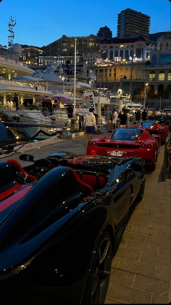 a row of sports cars parked next to each other