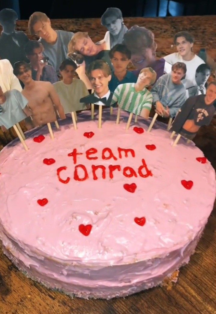 a cake with the words team corrd on it surrounded by pictures of people